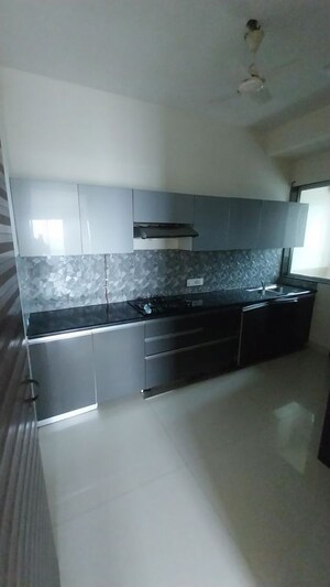 Kitchen in 2 BHK Apartment at Ajmera Zeon, Bhakti Park – for Rent