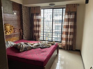 Bedroom in 2 BHK Apartment at Om Paradise Nerul, Nerul Sector 50e – for Rent