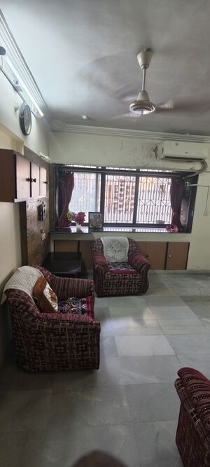 Living Room in 2.5 BHK Apartment at Satellite Garden, Goregaon East – for Rent