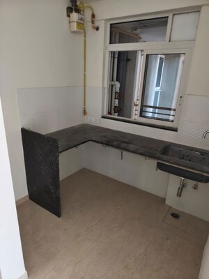 Kitchen in 1 BHK Apartment at Transcon Triumph Tower 2, Andheri West – for Rent