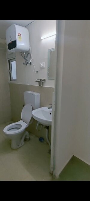 Bathroom in 3 BHK Apartment at Conscient Habitat 102, Sector 102 – for Rent