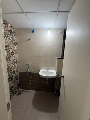 Bathroom in 2 BHK Apartment at Mahindra Happinest Tathawade Phase 1, Tathawade – for Rent