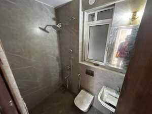 Bathroom in 1 BHK Apartment at Transcon Triumph Tower, Andheri West – for Rent