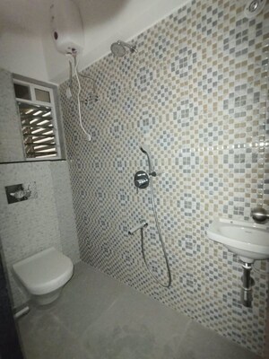 Bathroom in 1.5 BHK Apartment at Atmiya Centria, Santacruz East – for Rent