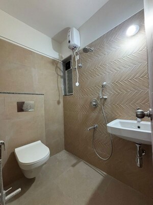 Bathroom in 1 BHK Apartment at Atmiya Centria, Santacruz East – for Rent