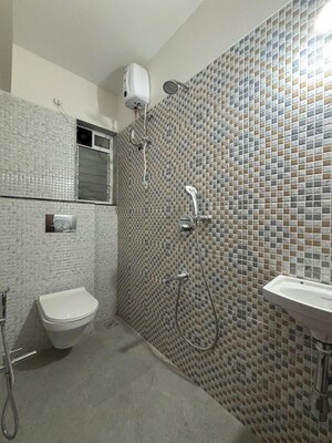 Bathroom in 1 BHK Apartment at Atmiya Centria, Santacruz East – for Rent