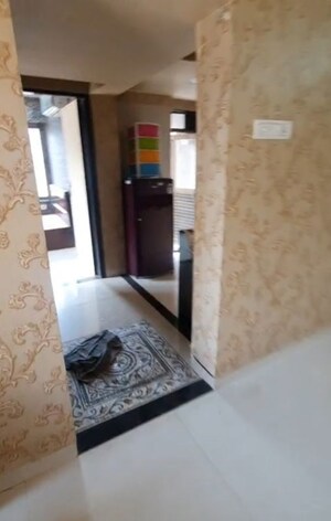 Living Room in 1 BHK Apartment at Pegasus Tower, Andheri West – for Sale