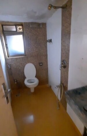 Bathroom in 1 BHK Apartment at Pegasus Tower, Andheri West – for Sale