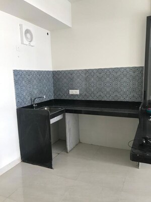 Kitchen in 2 BHK Apartment at Lodha Quality Home Tower 2, Majiwada – for Rent