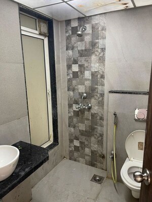 Bathroom in 4 BHK Apartment at Gaurav Palace I, Kandivali West – for Rent