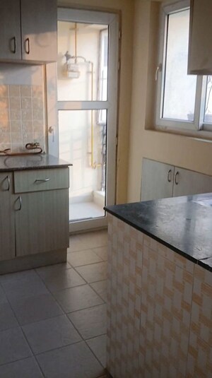 Kitchen in 3 BHK Apartment at Uppal Plumeria Garden Estate, Omicron Iii Greater Noida – for Sale