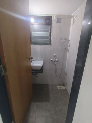 Bathroom in 1.5 BHK Apartment at Atmiya Centria, Santacruz East – for Rent