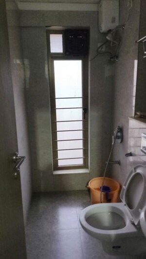 Bathroom in 3 BHK Apartment at Sheth Vasant Blossom, Marol – for Rent