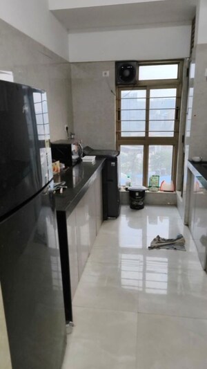 Kitchen in 3 BHK Apartment at Sheth Vasant Blossom, Marol – for Rent