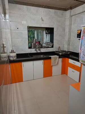 Kitchen in 2 BHK Apartment at Rituraj CHS Market Yard, Market Yard – for Rent