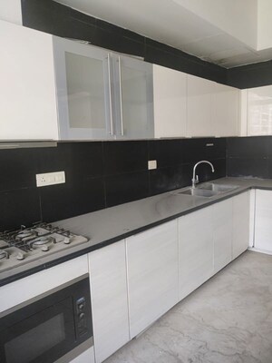 Kitchen in 2 BHK Apartment at M3M Golf Estate, Sector 65 – for Sale