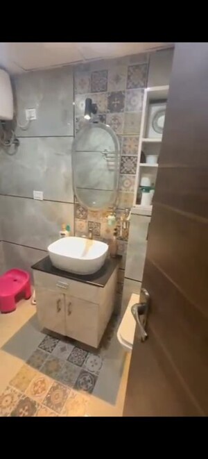 Bathroom in 3.5 BHK Apartment at Antriksh Golf View, Sector 78 – for Rent