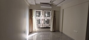 Living Room in 2 BHK Apartment at Bhartiya City Nikoo Homes 4, Thanisandra Main Road – for Rent