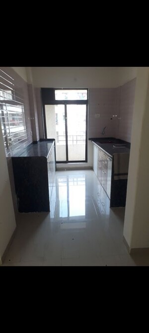 Kitchen in 2 BHK Apartment at P And B Krishna Heights, Virar West – for Rent