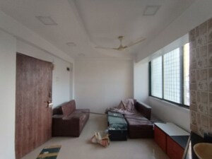 Living Room in 2 BHK Apartment at Sunrise Arcade, Kopar Khairane – for Rent