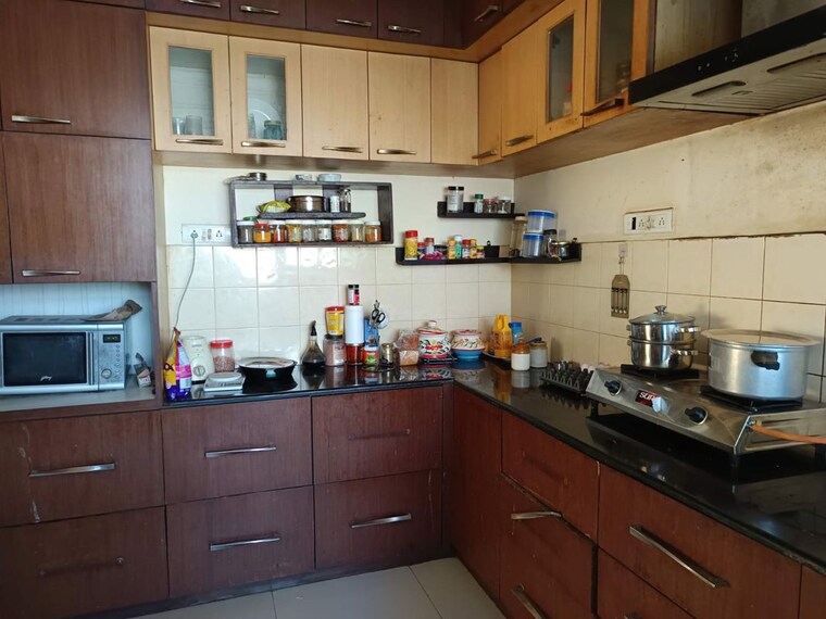 Kitchen, golden-palms-apartment-bangalore 3 Bedroom 1835 Sq.Ft. Apartment In Thanisandra Main Road Bangalore 10791635
