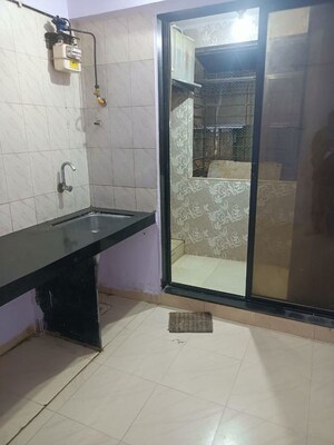 Kitchen in 1 BHK Apartment at Teen Dongri, Goregaon West – for Sale
