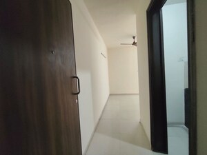 Building Lobby in 1.5 BHK Apartment at Marathon Nexzone, New Panvel – for Rent