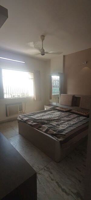 Bedroom in 2 BHK Apartment at Vikas Park CHS, Malad West – for Rent