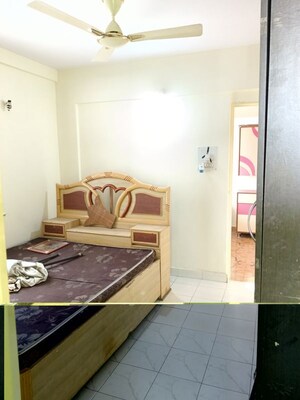 Bedroom in 2 BHK Apartment at Kute Vrundavan Society, Akurdi – for Rent