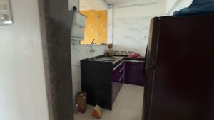 Kitchen in 2 BHK Apartment at Neminath Avenue, Andheri West – for Sale