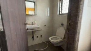 Bathroom in 2 BHK Apartment at Neminath Avenue, Andheri West – for Sale