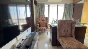Living Room in 2 BHK Apartment at Neminath Avenue, Andheri West – for Sale