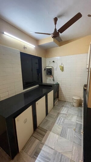 Kitchen in 2 BHK Apartment at Raj Mahal Apartment Andheri, Andheri West – for Rent