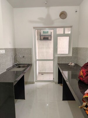 Kitchen in 2 BHK Apartment at Godrej Nurture Pune, Mamurdi – for Rent