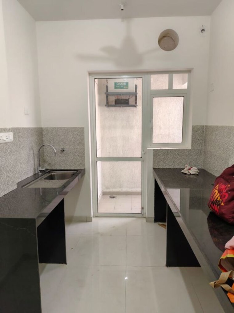 Kitchen, godrej-nurture-pune 2 Bedroom 825 Sq.Ft. Apartment In Mamurdi Pune 10792338