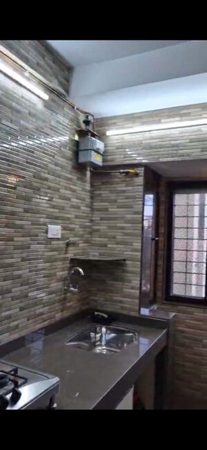 Kitchen in 1 BHK Apartment at Acme Complex 2A, Goregaon West – for Sale