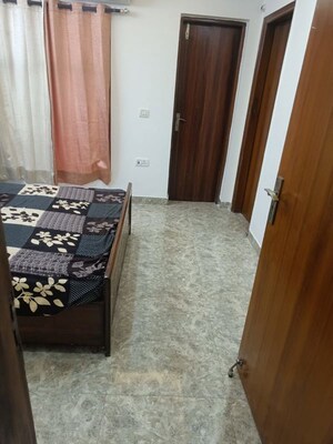 Bedroom in 3 BHK Builder Floor at Ansal Sushant Lok I, Sector 43 – for Rent