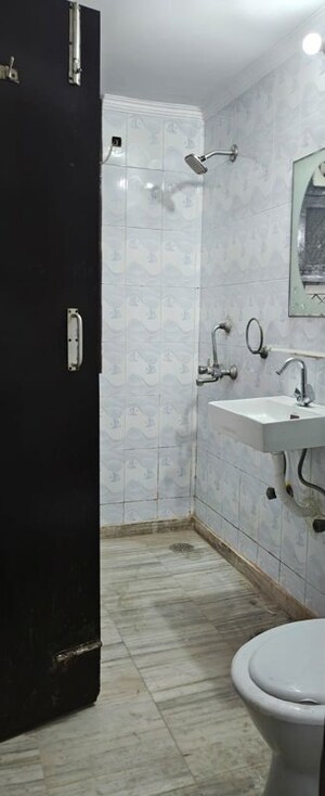 Bathroom in 3 BHK Apartment at Dwarka – for Rent