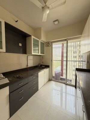 Kitchen in 2 BHK Apartment at Narang Rozanne by Courtyard, Pokhran Road No Two – for Rent