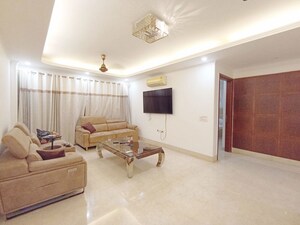 Living Room in 3 BHK Apartment at Pamposh Enclave – for Rent