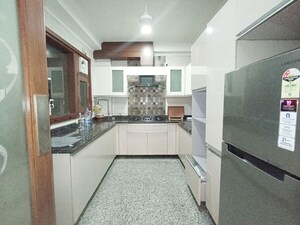 Kitchen in 3 BHK Apartment at Pamposh Enclave – for Rent