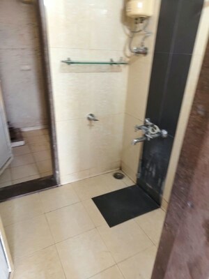 Bathroom in 2 BHK Apartment at Vijay Galaxy, Waghbil – for Rent