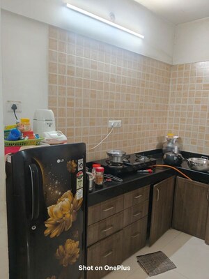 Kitchen in 2 BHK Apartment at GK Rose Mansion, Punawale – for Rent