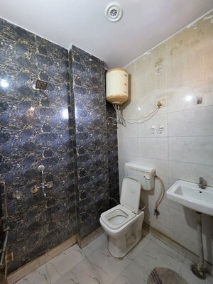 Bathroom in 2 BHK Builder Floor at Mohan Garden – for Rent