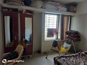 Living Room in 1 BHK Apartment at Rainbow Housing Urban Forest, Mamurdi – for Rent