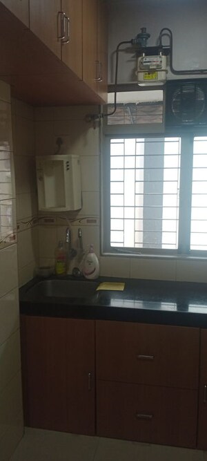 Kitchen in 1 BHK Apartment at Bindra Complex, Andheri East – for Rent