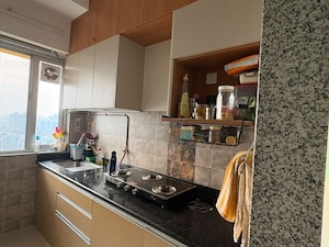 Kitchen in 2 BHK Apartment at NRI Complex Phase 2, Seawoods – for Rent