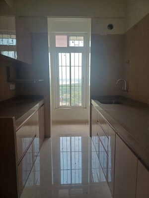 Kitchen in 2 BHK Apartment at Dosti Tulip, Balkum Pada – for Rent