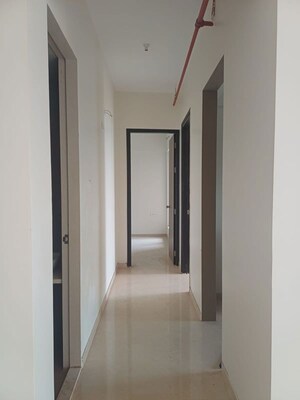 Building Lobby in 2 BHK Apartment at Dosti Tulip, Balkum Pada – for Rent