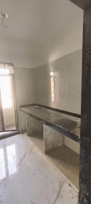 Kitchen in 1 BHK Apartment at Paradigm Zenith Pushpanjali Residency Phase III, Ghodbunder Road – for Rent